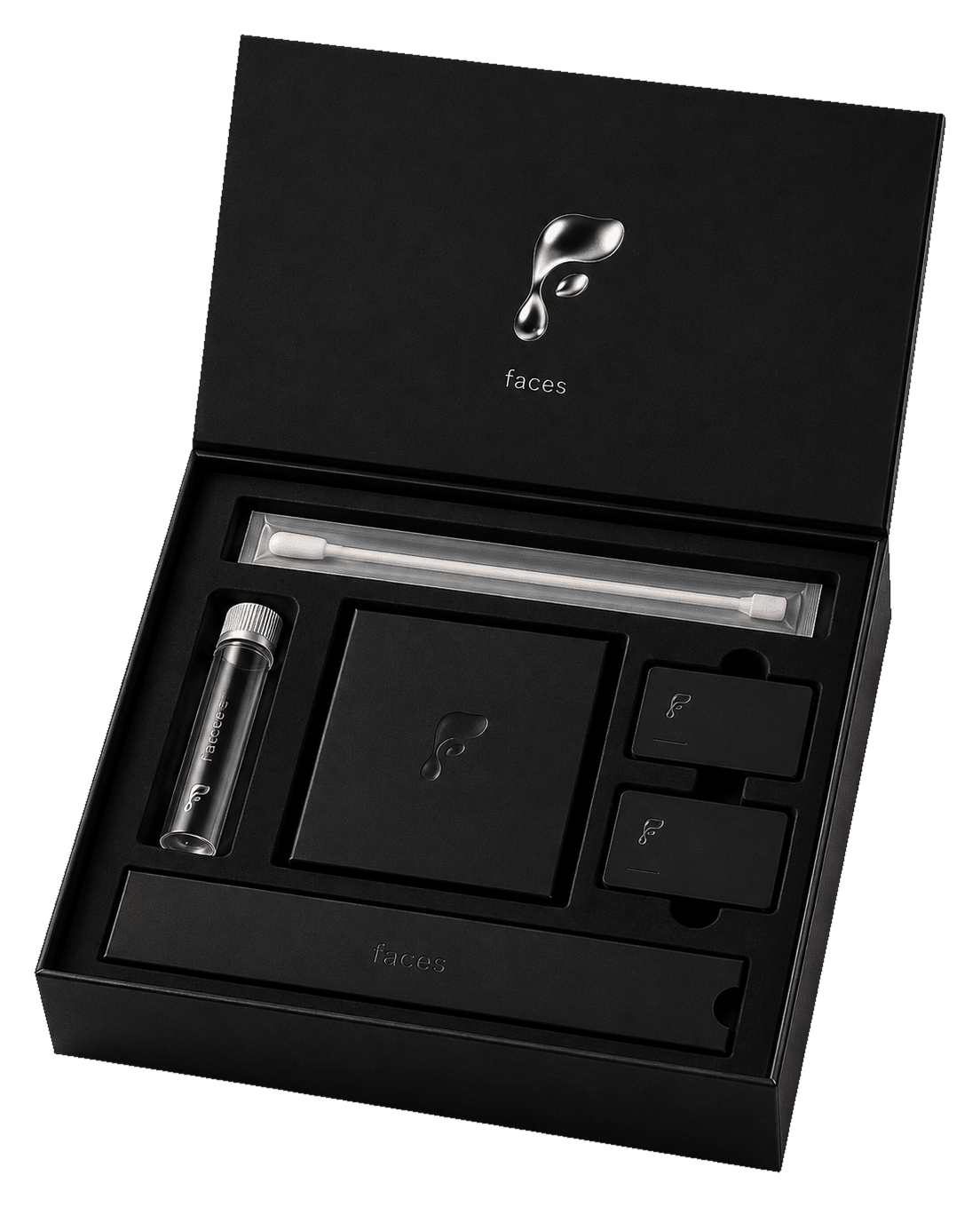 The Faces at-home skin testing kit, opened: a matte black case with the metallic Faces mark on the inside lid, an individually sleeved swab, a sample vial, a black results envelope and two small collection cards set in custom-cut black foam.
